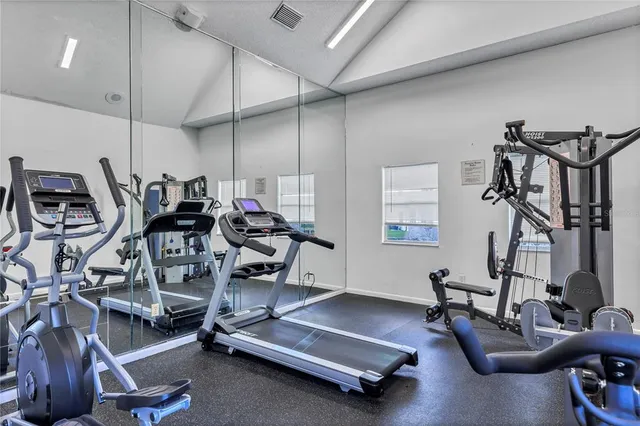 a sign on a street next to a road