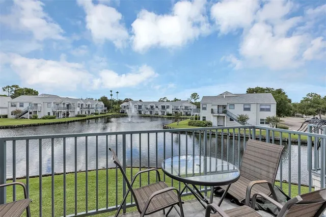 a view of a chairs on the roof deck