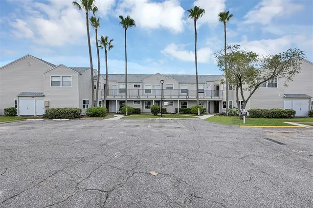 a view of a street with a building in the background