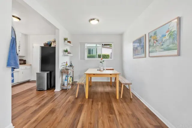 a kitchen with stainless steel appliances a sink and cabinets