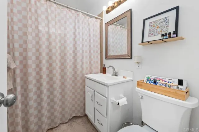 a view of a porch with furniture and garden