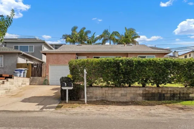 a swimming pool with outdoor seating and yard