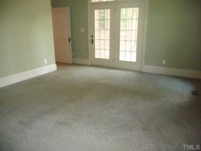 6215 Amed Road Bahama, NC 27503 - Photo 9 of 15 Master bedroom open up to rear patio