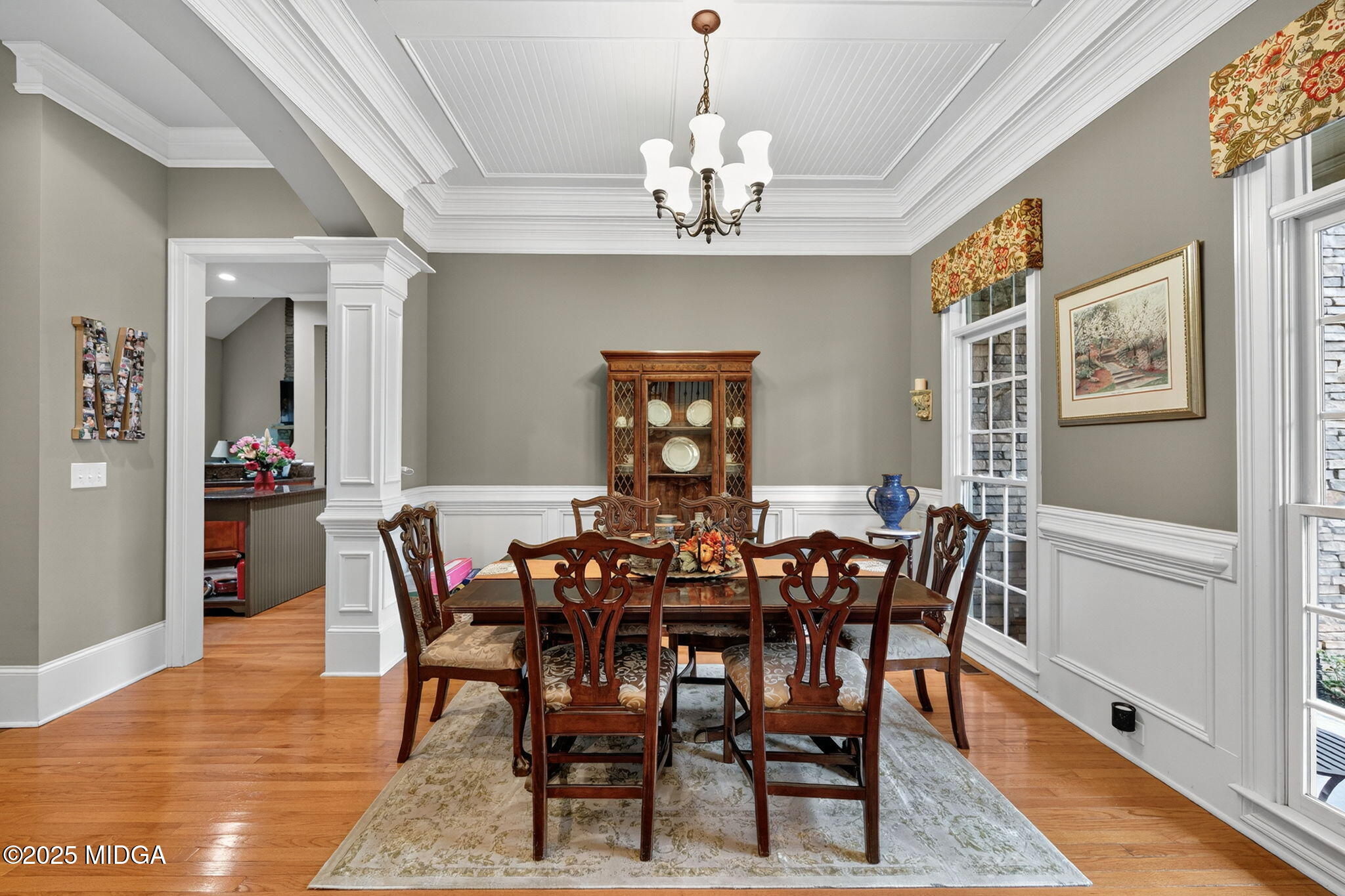 120 Homestead Circle Forsyth, GA 31029 - Photo 11 of 68 a view of a dining room with furniture wooden floor and chandelier