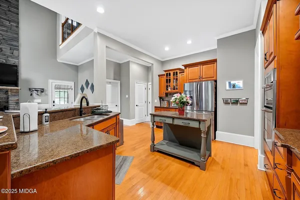 a spacious bedroom with a bed and a couch