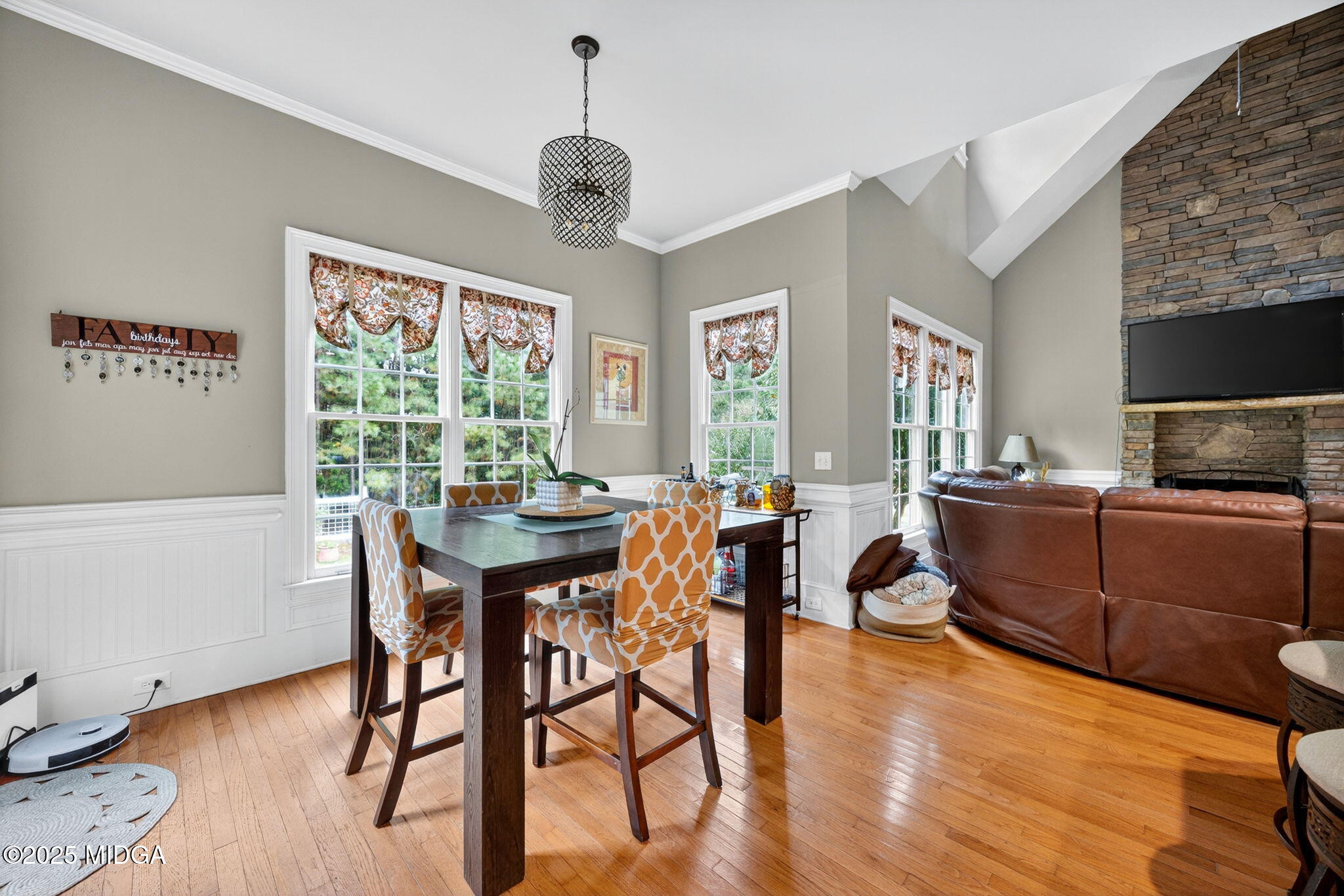 120 Homestead Circle Forsyth, GA 31029 - Photo 15 of 68 a view of a dining room with furniture window and wooden floor
