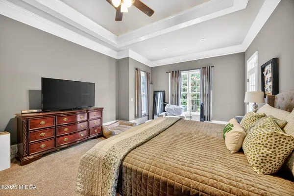 a bed room with a bed and a couch