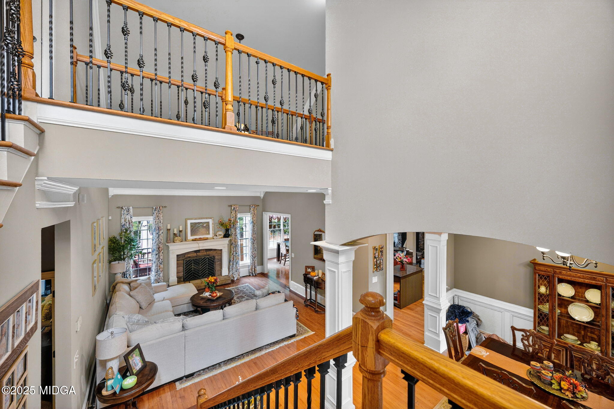 120 Homestead Circle Forsyth, GA 31029 - Photo 22 of 68 a living room with furniture and a flat screen tv