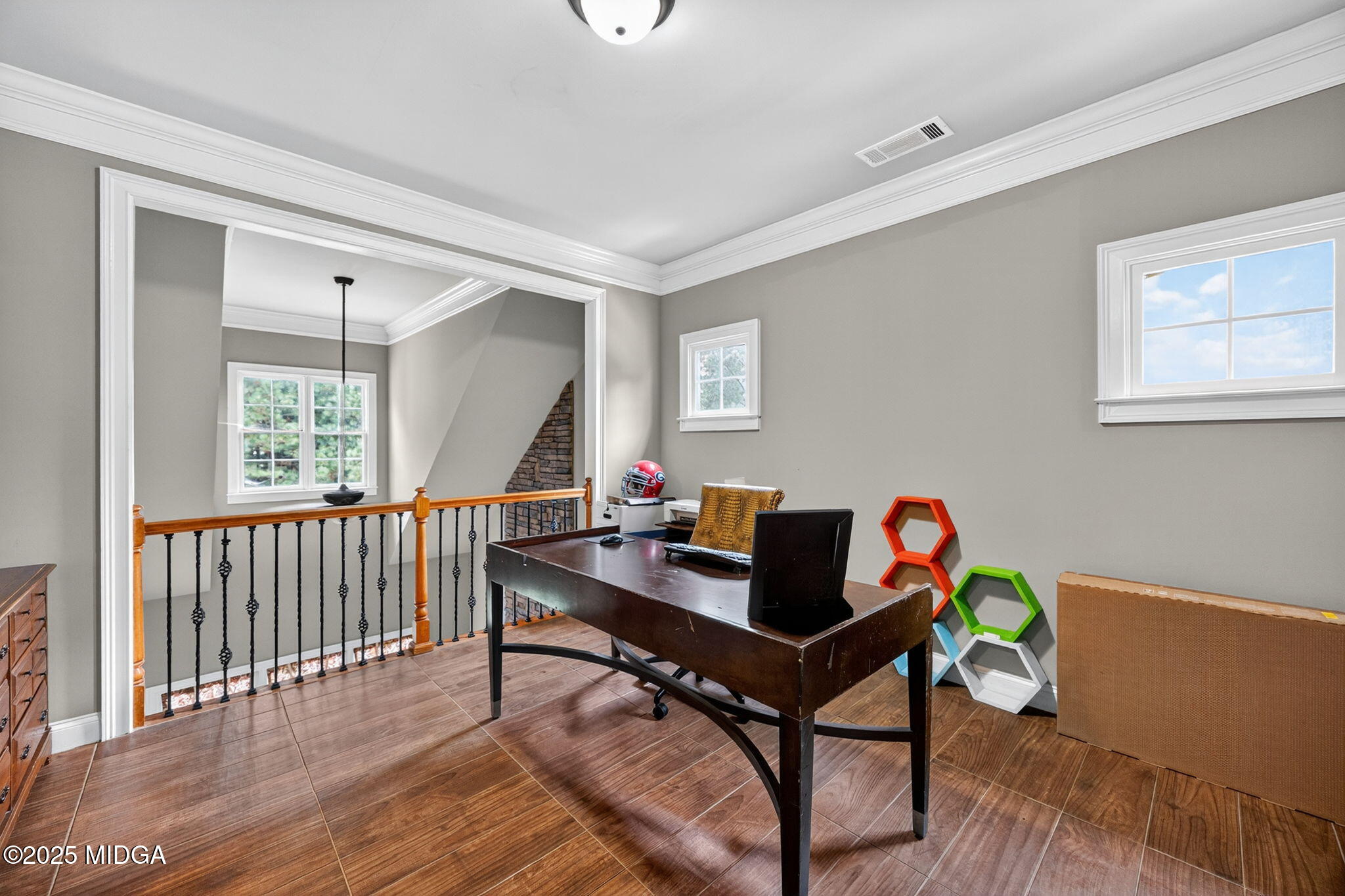 120 Homestead Circle Forsyth, GA 31029 - Photo 31 of 68 a workspace with wooden floor