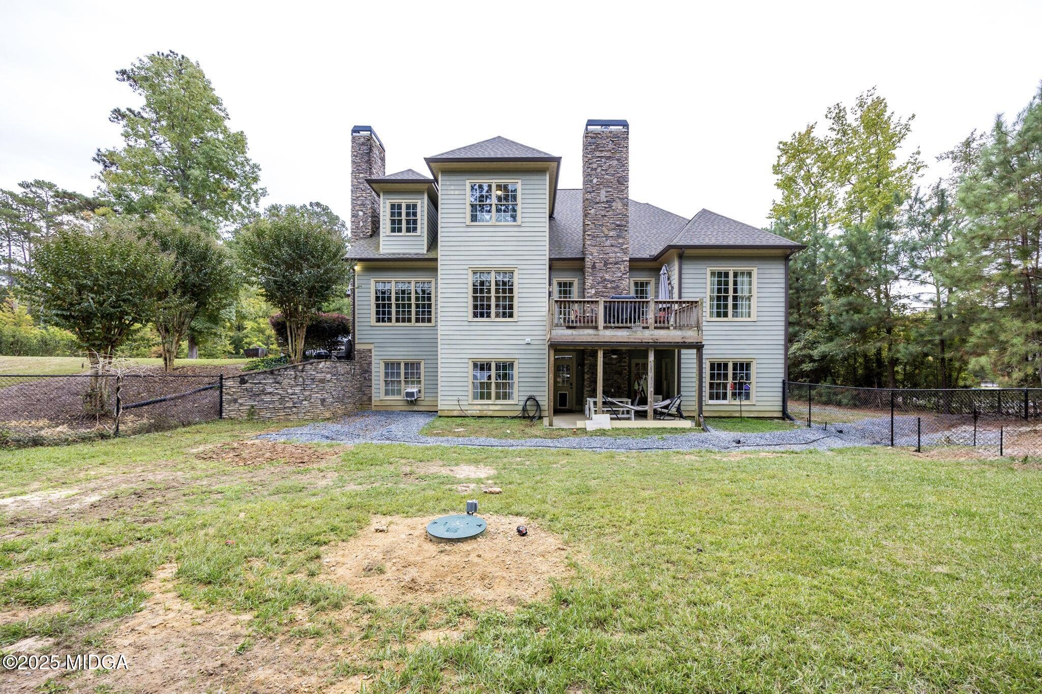 120 Homestead Circle Forsyth, GA 31029 - Photo 44 of 68 a view of a house with a swimming pool