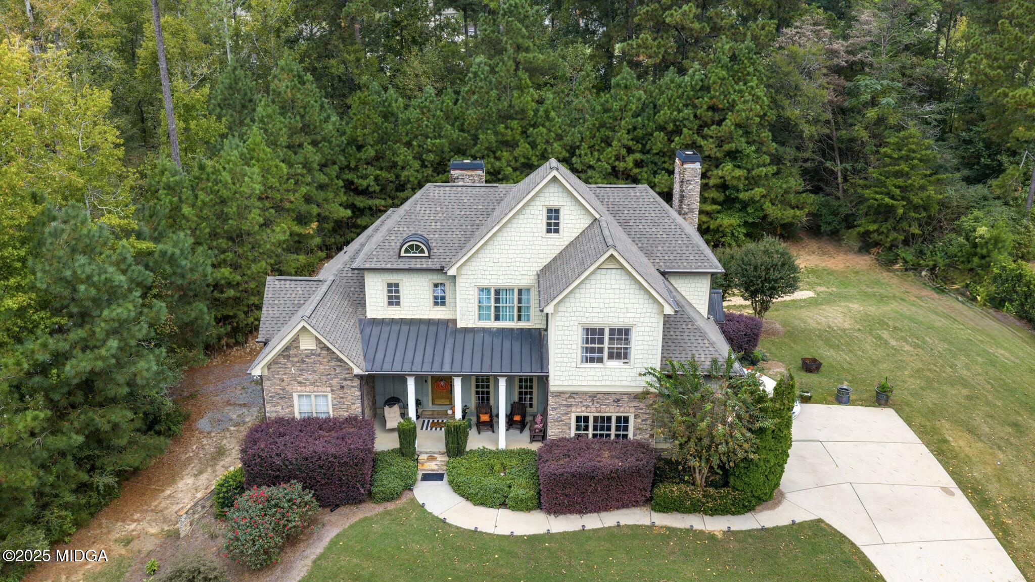 120 Homestead Circle Forsyth, GA 31029 - Photo 47 of 68 a aerial view of a house next to a yard