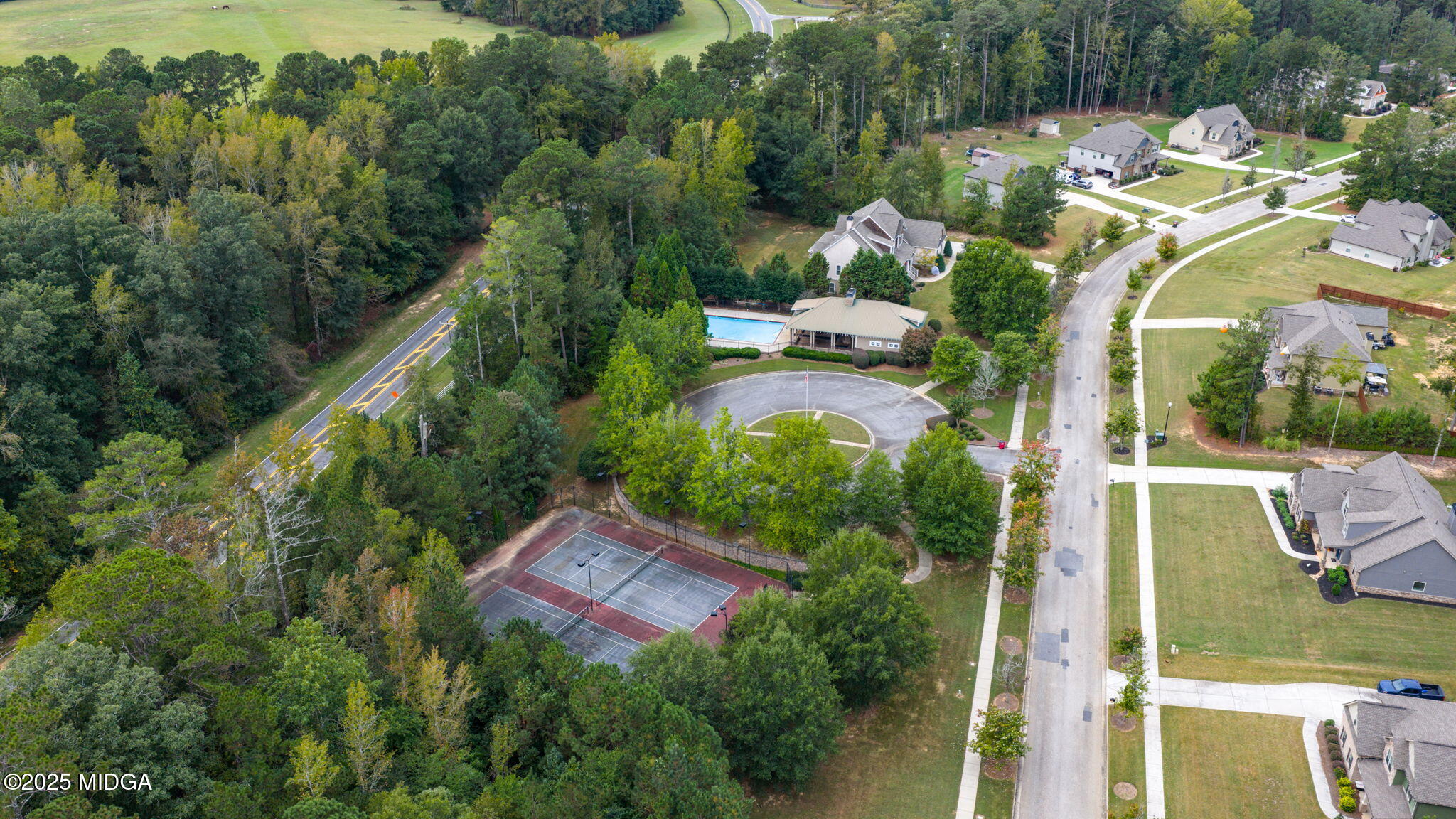 120 Homestead Circle Forsyth, GA 31029 - Photo 63 of 68 an aerial view of residential house with outdoor space and swimming pool