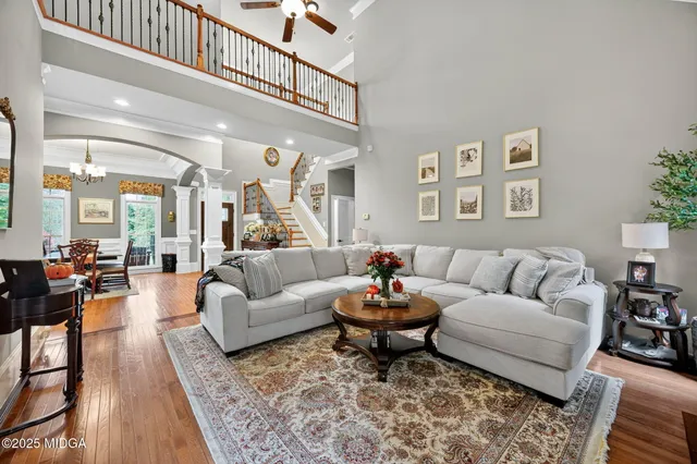a kitchen with stainless steel appliances granite countertop sink stove top oven and cabinets