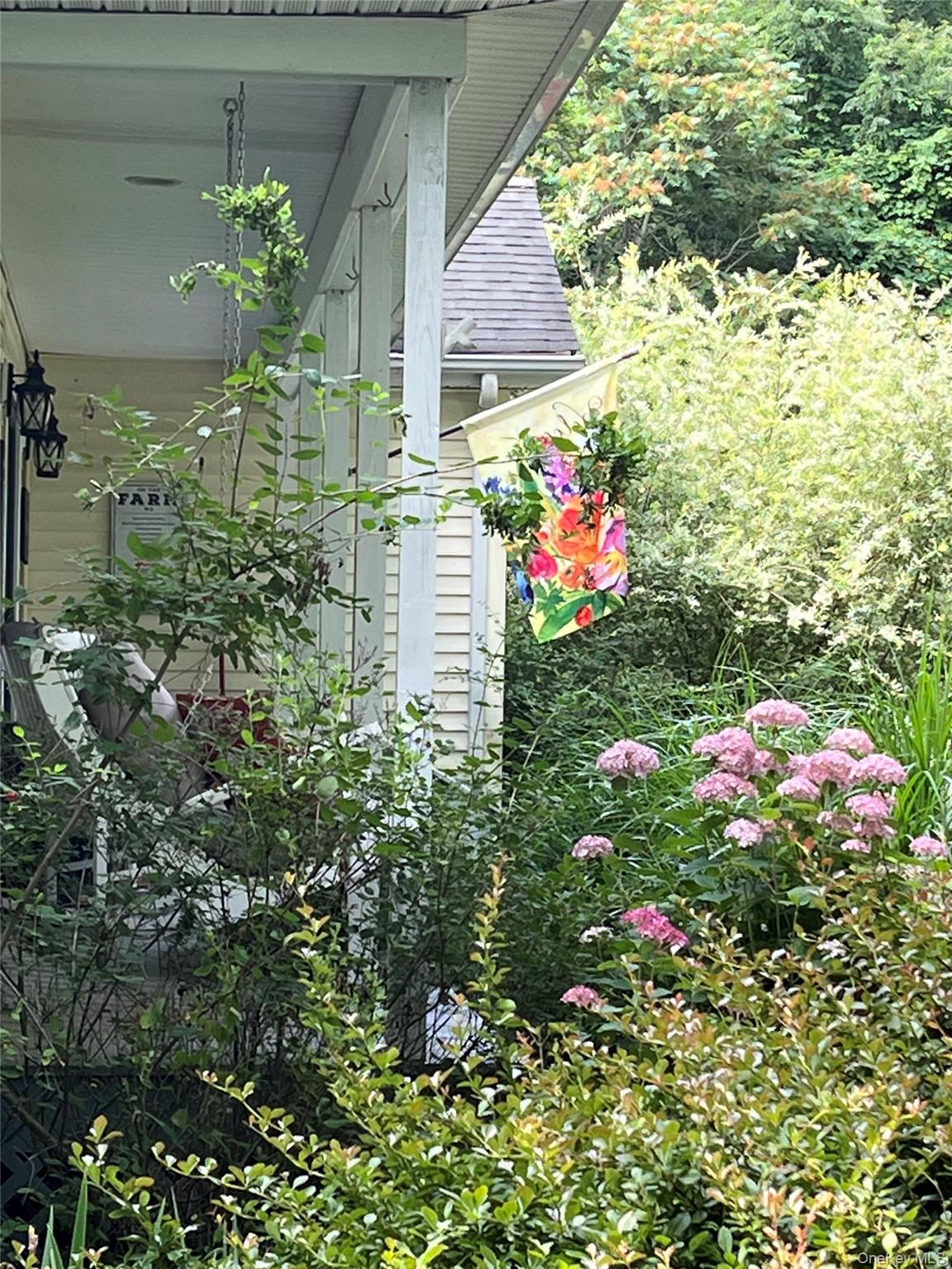 124 Rutsonville Road Wallkill, NY 12589 - Photo 5 of 33 Rocking Chair Front Porch Overlooking Flowering Yard