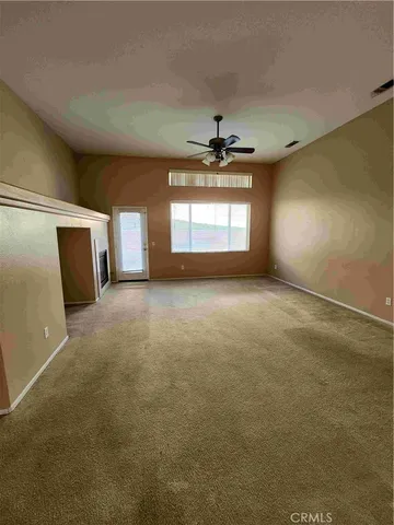 a view of a livingroom with a fireplace