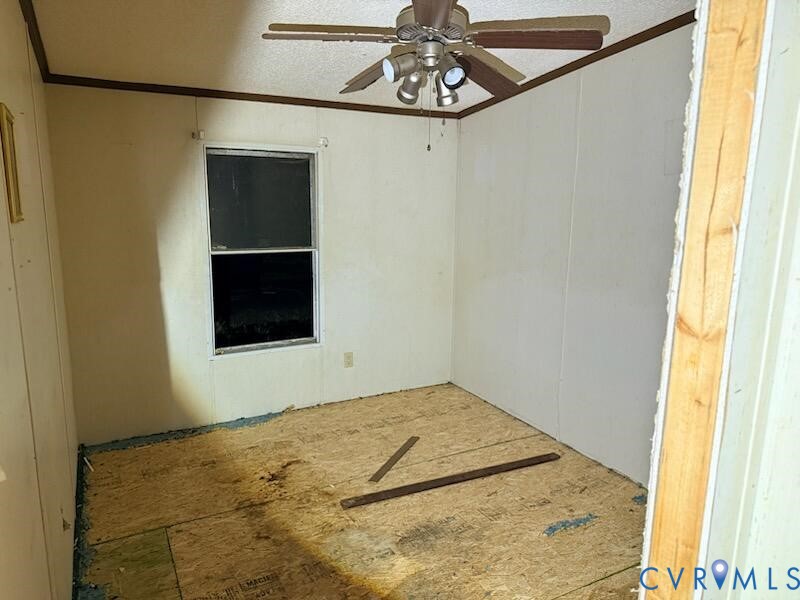 1036 Callis Road South Hill, VA 23970 - Photo 3 of 7 a view of an empty room with a window