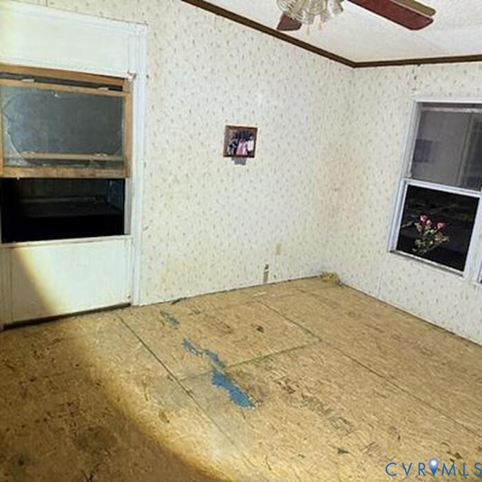 1036 Callis Road South Hill, VA 23970 - Photo 5 of 7 a view of empty room with a fireplace