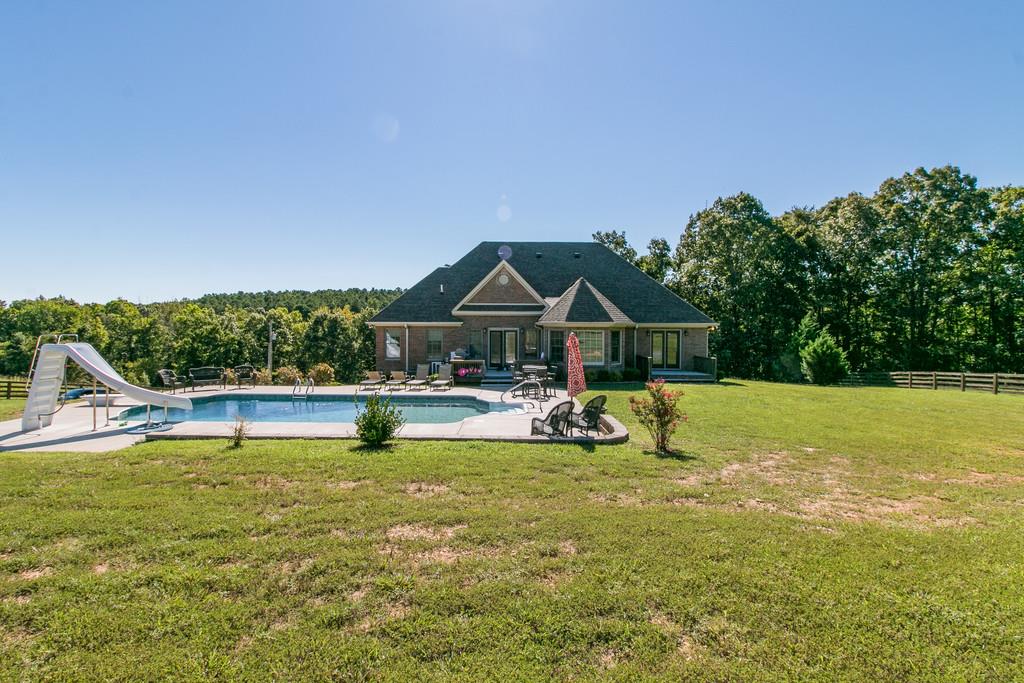 947 Bold Springs Road McEwen, TN 37101 - Photo 24 of 27 Rear of home and pool