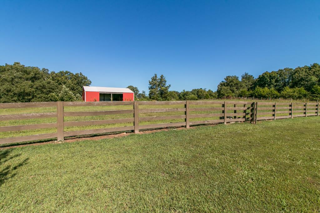 947 Bold Springs Road McEwen, TN 37101 - Photo 26 of 27 Wood fence and Barn / Shop