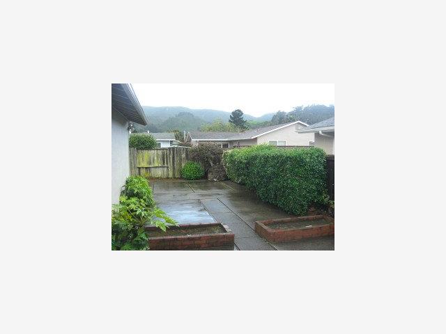 832 Standish Road Pacifica, CA 94044 - Photo 8 of 9 a picture of a person on a street