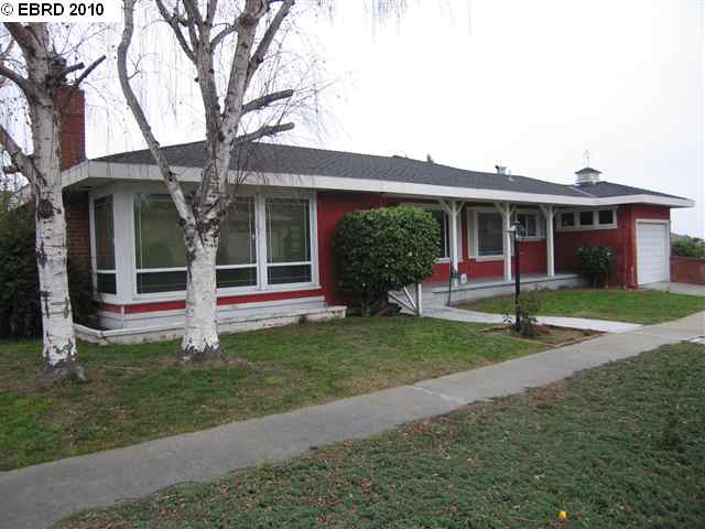 246 Harris Avenue Rodeo, CA 94572 - Photo 1 of 1 a view of a house with a yard and plants