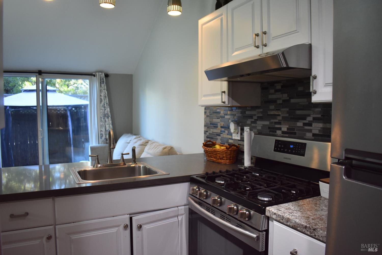 172 Courtyards East Windsor, CA 95492 - Photo 5 of 15 a kitchen with a stove and a sink
