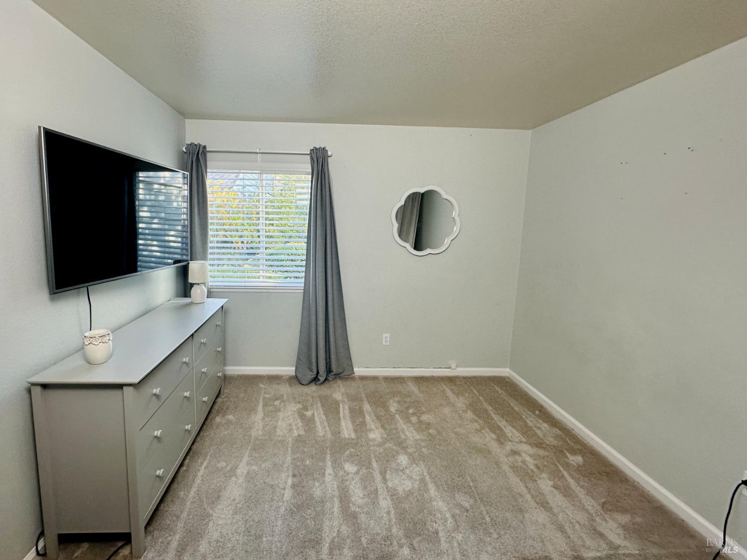 172 Courtyards East Windsor, CA 95492 - Photo 8 of 15 a bathroom with a sink and a mirror