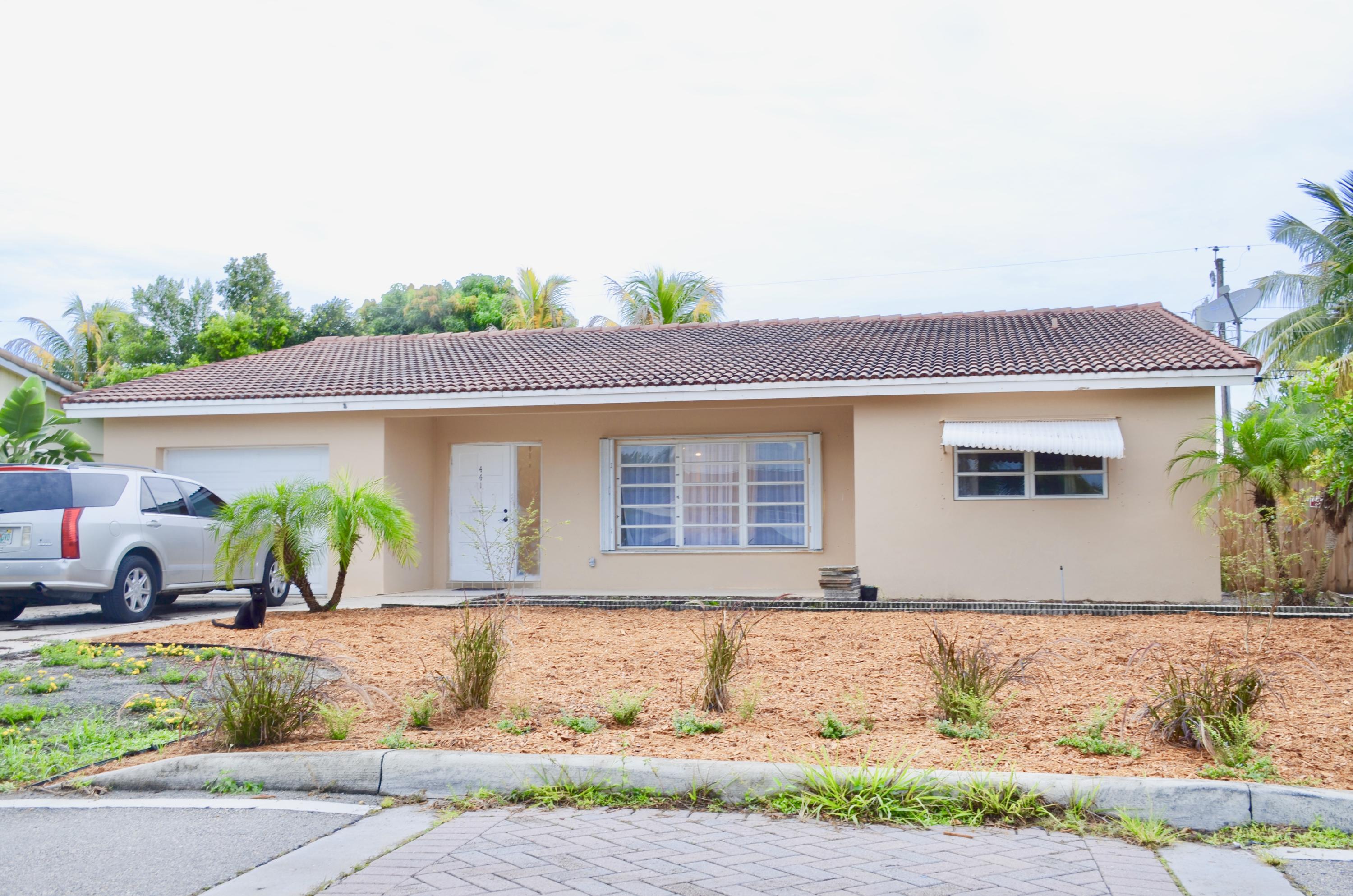 441 Northeast 25th Terrace Boca Raton, FL 33431 - Photo 1 of 25 Front of house
