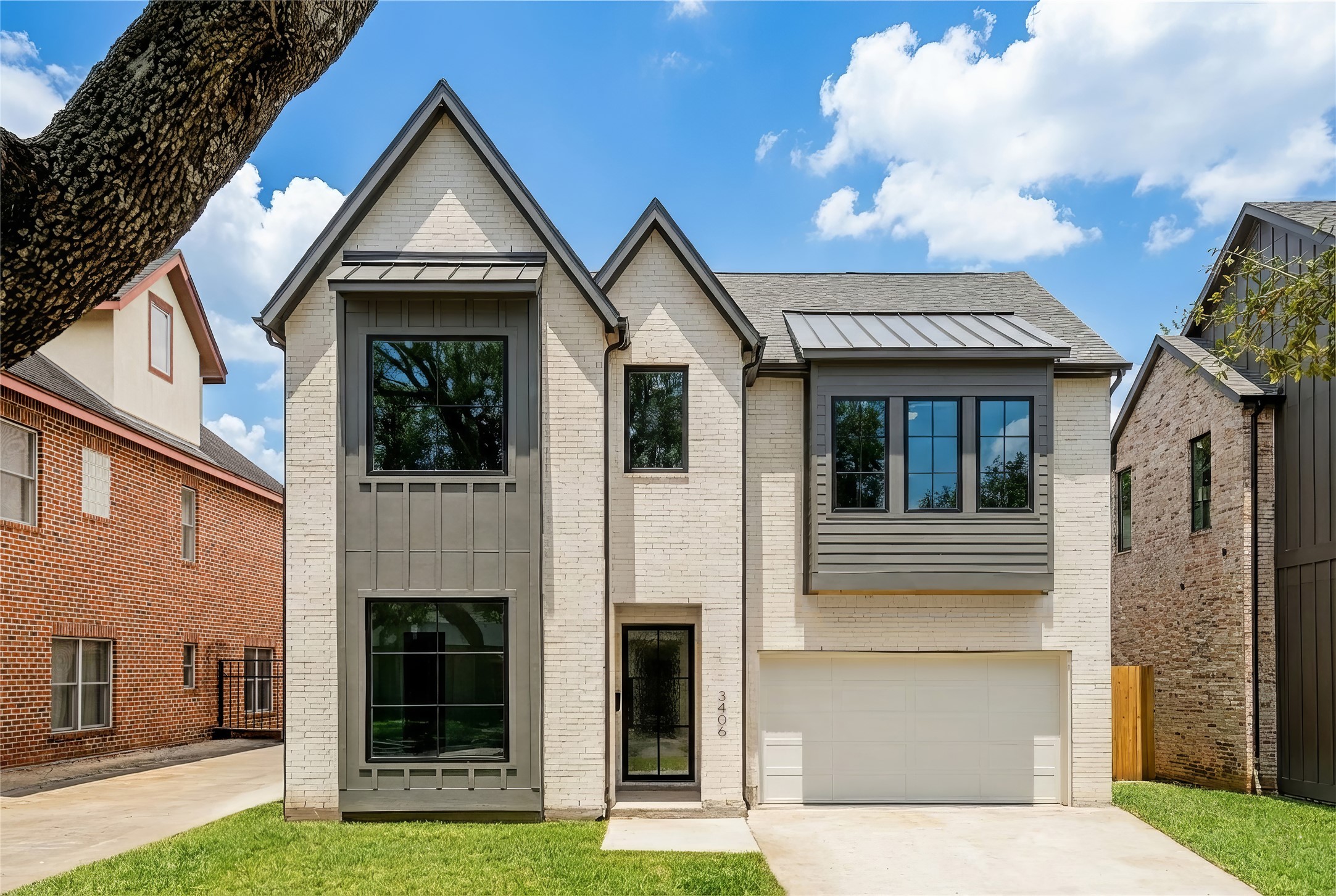 a front view of a house with a yard