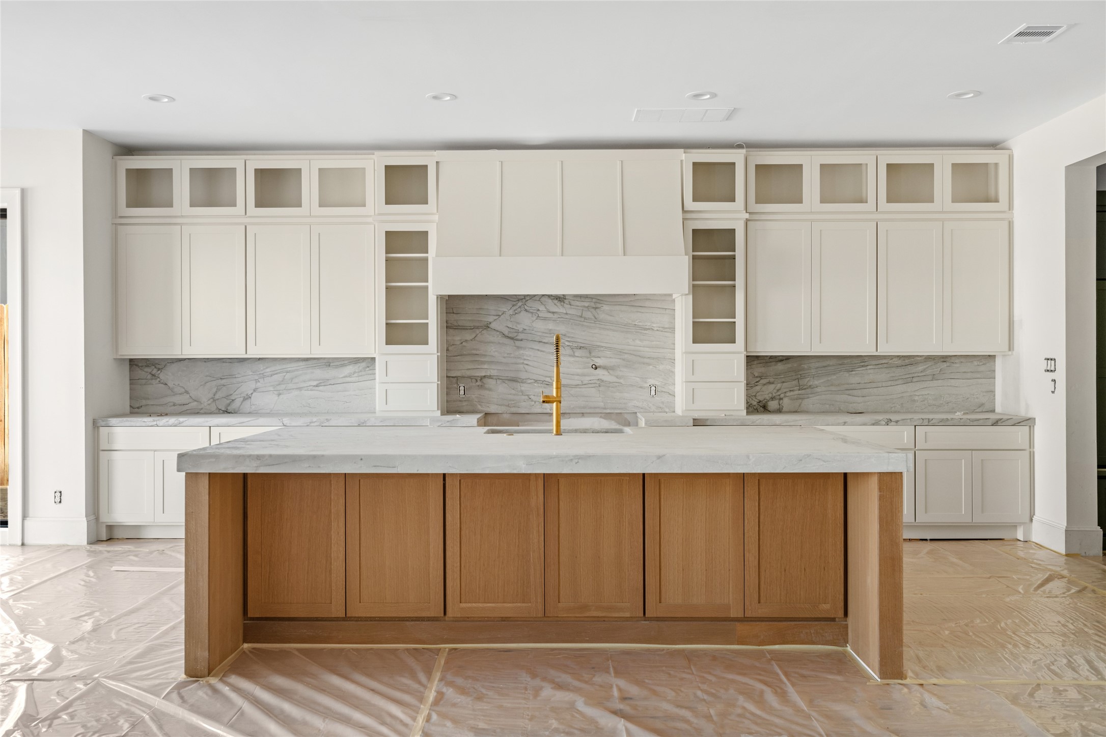 3406 Rice Boulevard Houston, TX 77005 - Photo 3 of 9 a kitchen with stainless steel appliances granite countertop a sink and cabinets
