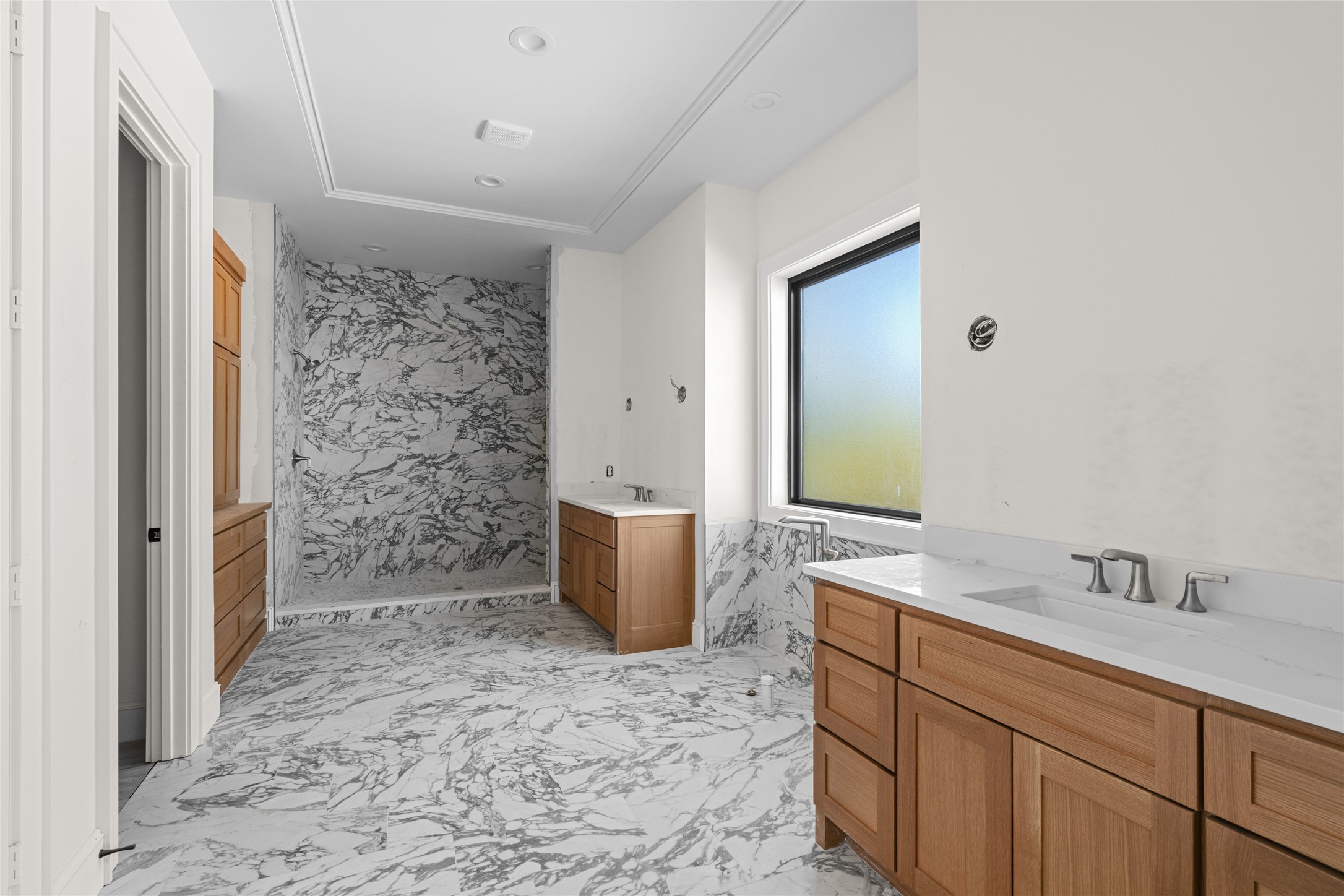 3406 Rice Boulevard Houston, TX 77005 - Photo 8 of 9 a bathroom with a sink and a mirror