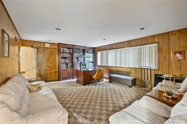 a bedroom with a couch and a couch