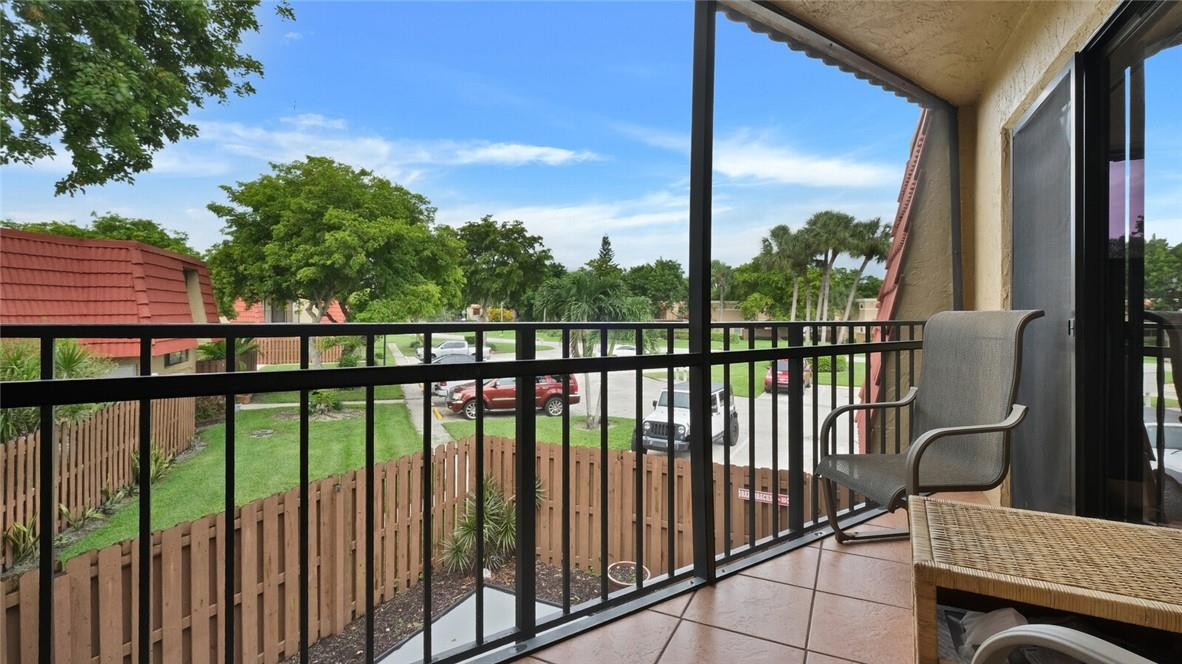 8146 Thames Boulevard, Unit A Boca Raton, FL 33433 - Photo 17 of 18 a view of a balcony
