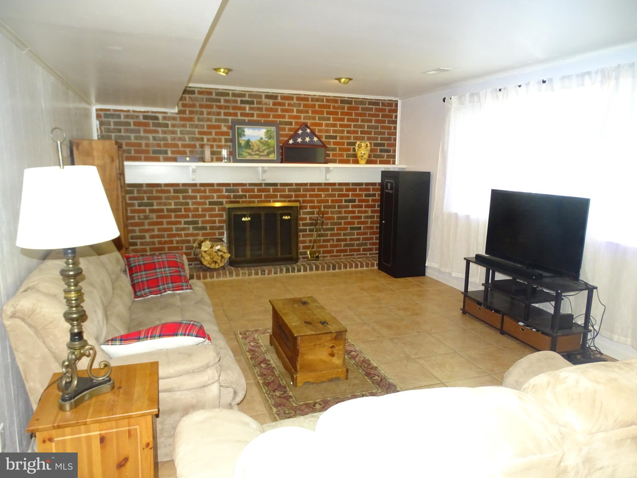 15 David Road Southampton, PA 18966 - Photo 8 of 29 Family room with fireplace