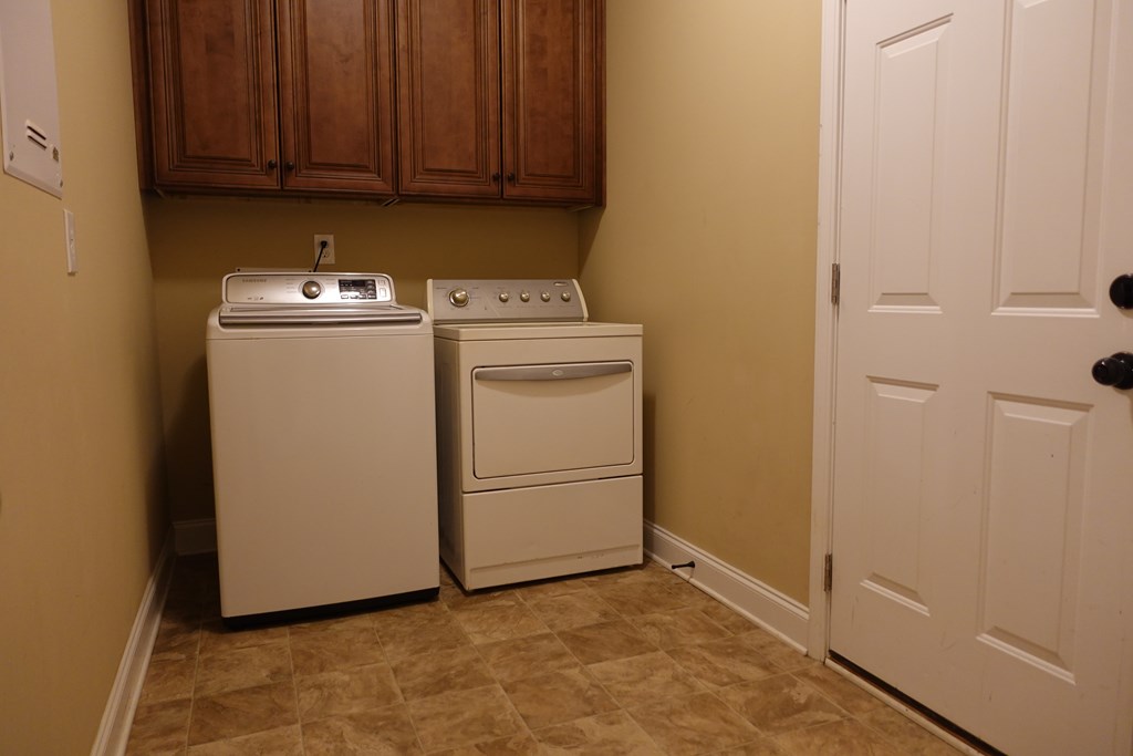 9981 Coppice Court Midland, GA 31820 - Photo 16 of 33 a room with storage and utility