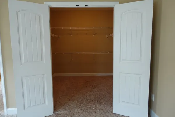 a view of a room with racks on the wall