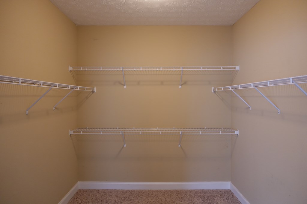 9981 Coppice Court Midland, GA 31820 - Photo 20 of 33 a view of a room with racks on the wall