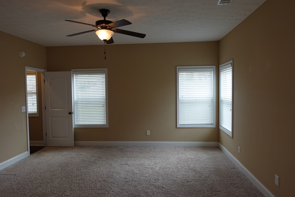 9981 Coppice Court Midland, GA 31820 - Photo 27 of 33 a view of an empty room with a window