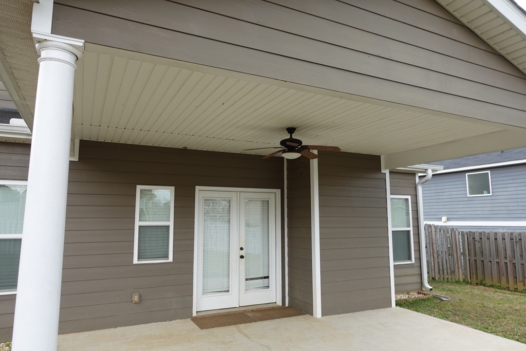 9981 Coppice Court Midland, GA 31820 - Photo 33 of 33 a front view of a house with a glass door