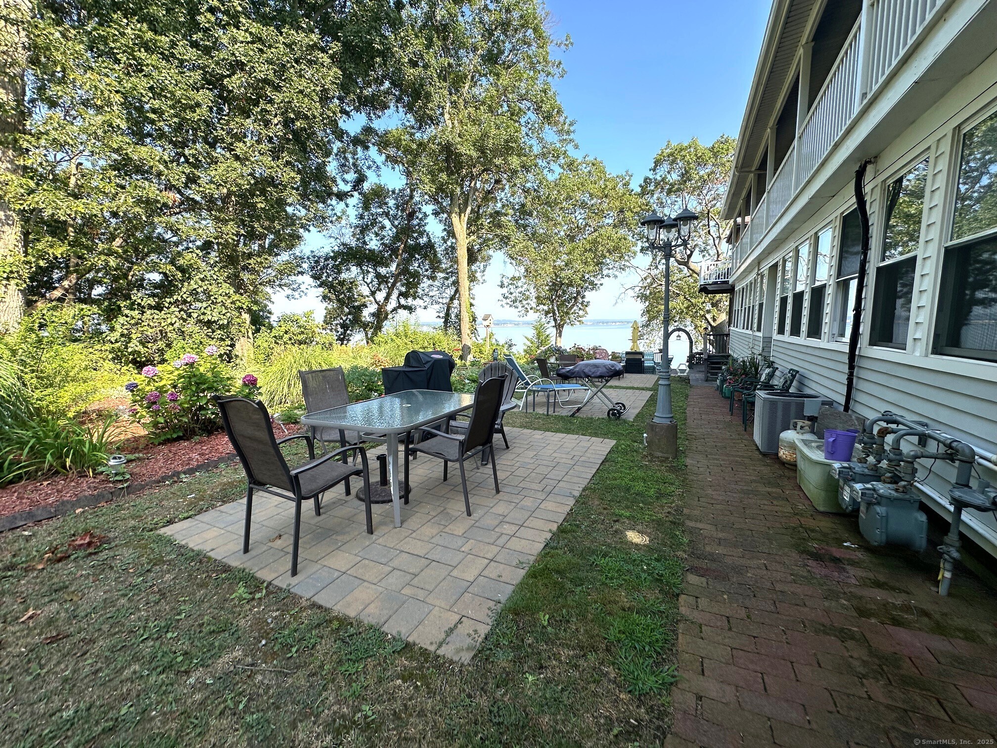 1 Cora Street, Unit 4 New Haven, CT 06512 - Photo 17 of 22 a view of a tables and chairs on the patio