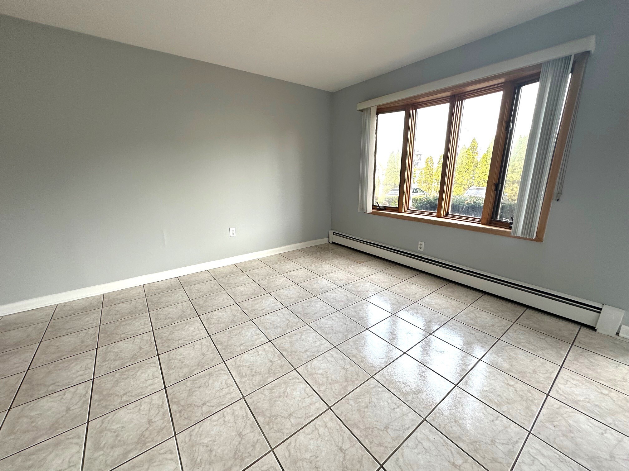 1 Cora Street, Unit 4 New Haven, CT 06512 - Photo 5 of 22 a view of an empty room and window