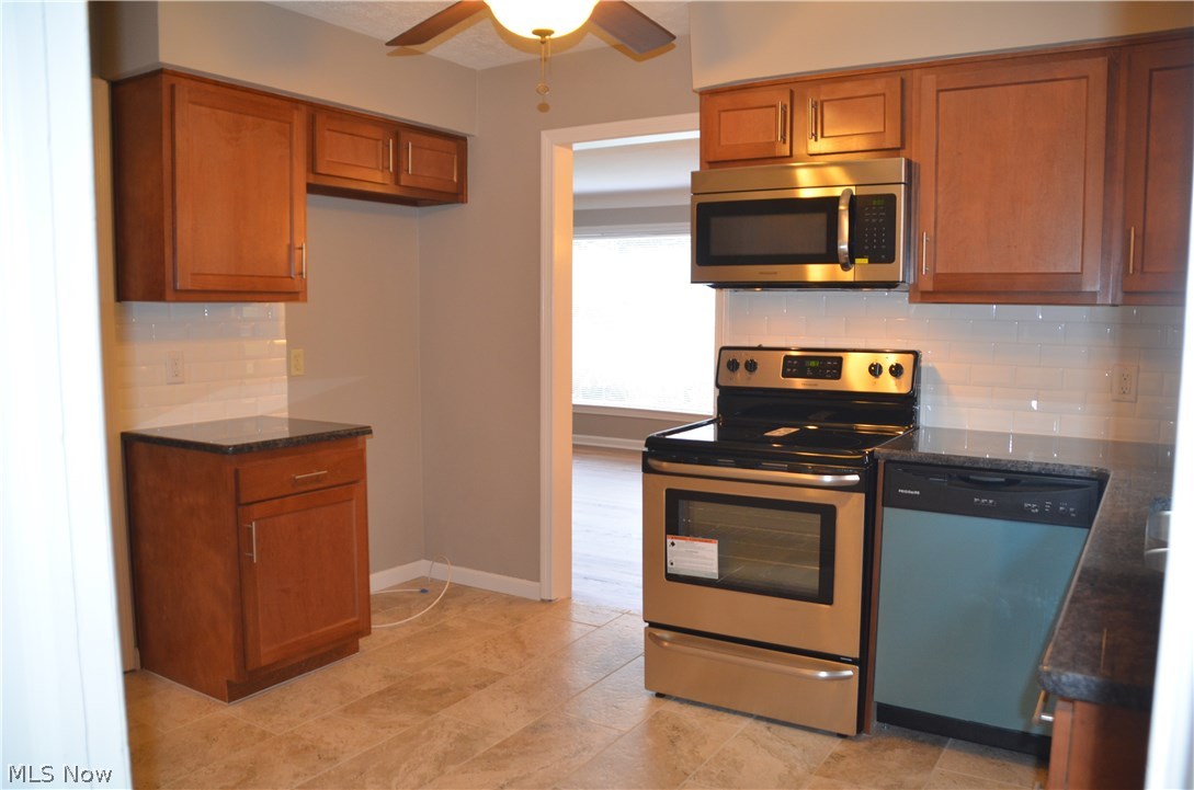 1560 Winchester Road Lyndhurst, OH 44124 - Photo 4 of 20 This wonderful kitchen has much to offer. Come see the new cabinets, granite counter tops, new appliances and nice wall tile. Ready to bake and cook?