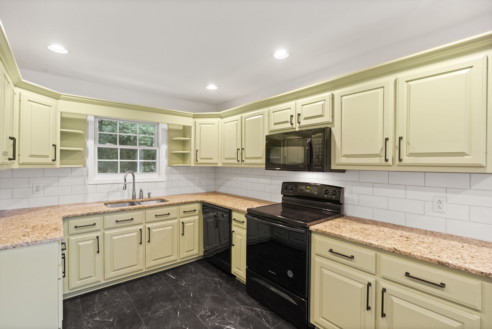 164 Foxrun Springfield, TN 37172 - Photo 16 of 37 a kitchen with a sink stove and microwave