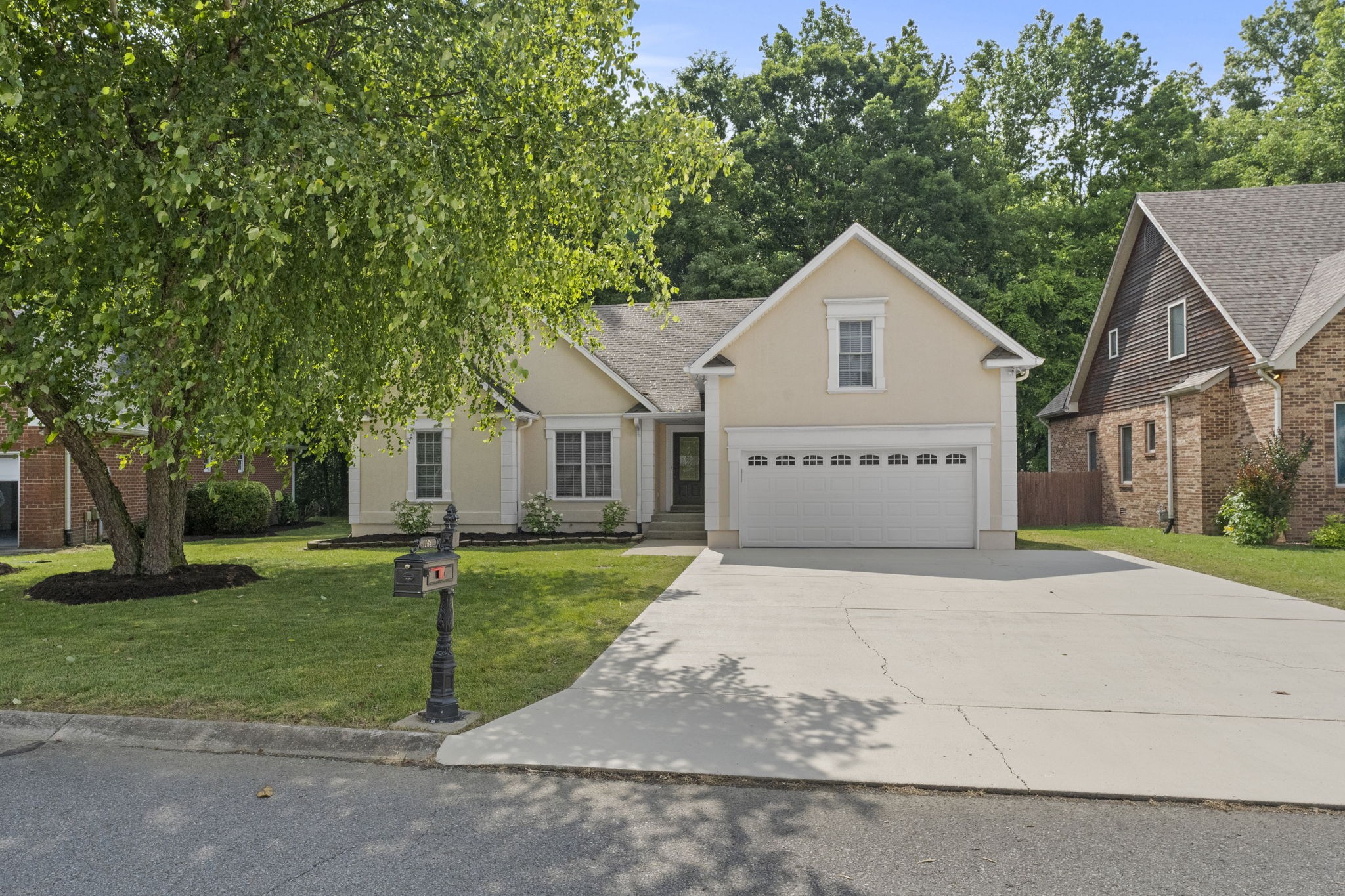 164 Foxrun Springfield, TN 37172 - Photo 2 of 37 a view of a house with a yard and large trees