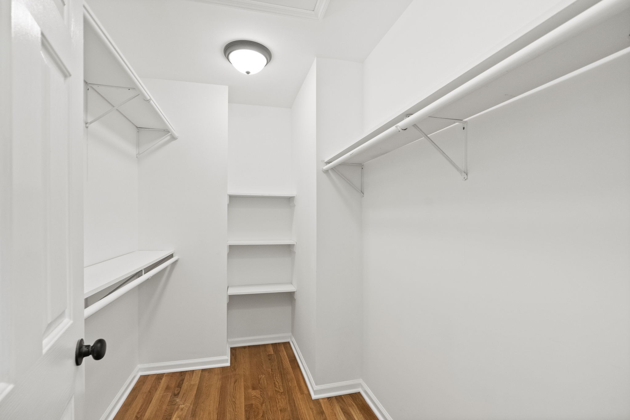 164 Foxrun Springfield, TN 37172 - Photo 22 of 37 a view of walk in closet with empty racks