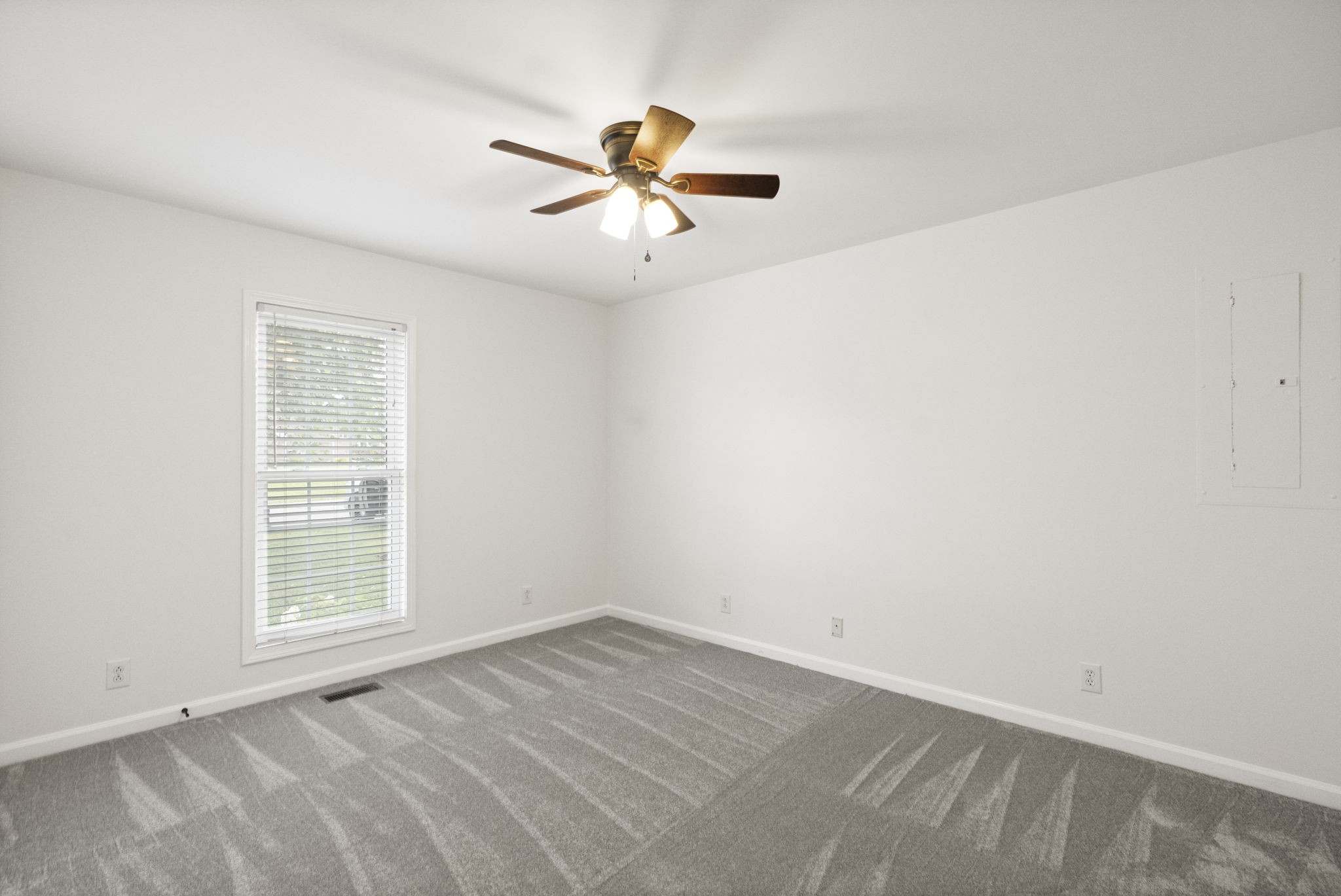 164 Foxrun Springfield, TN 37172 - Photo 26 of 37 an empty room with a window and a fan