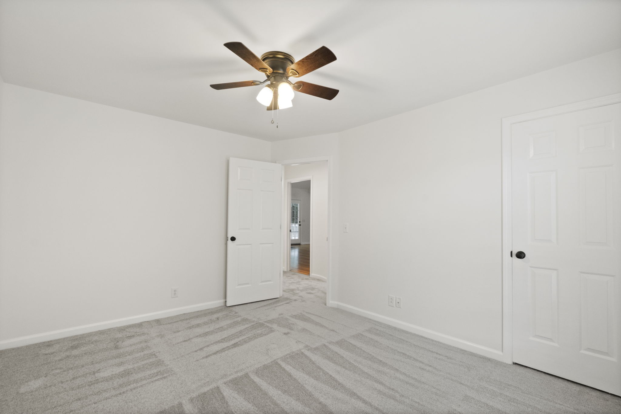 164 Foxrun Springfield, TN 37172 - Photo 27 of 37 an empty room with wooden floor and windows