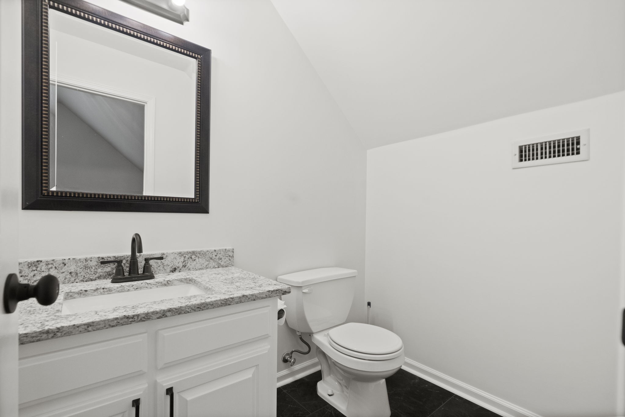 164 Foxrun Springfield, TN 37172 - Photo 35 of 37 a bathroom with a toilet sink and mirror