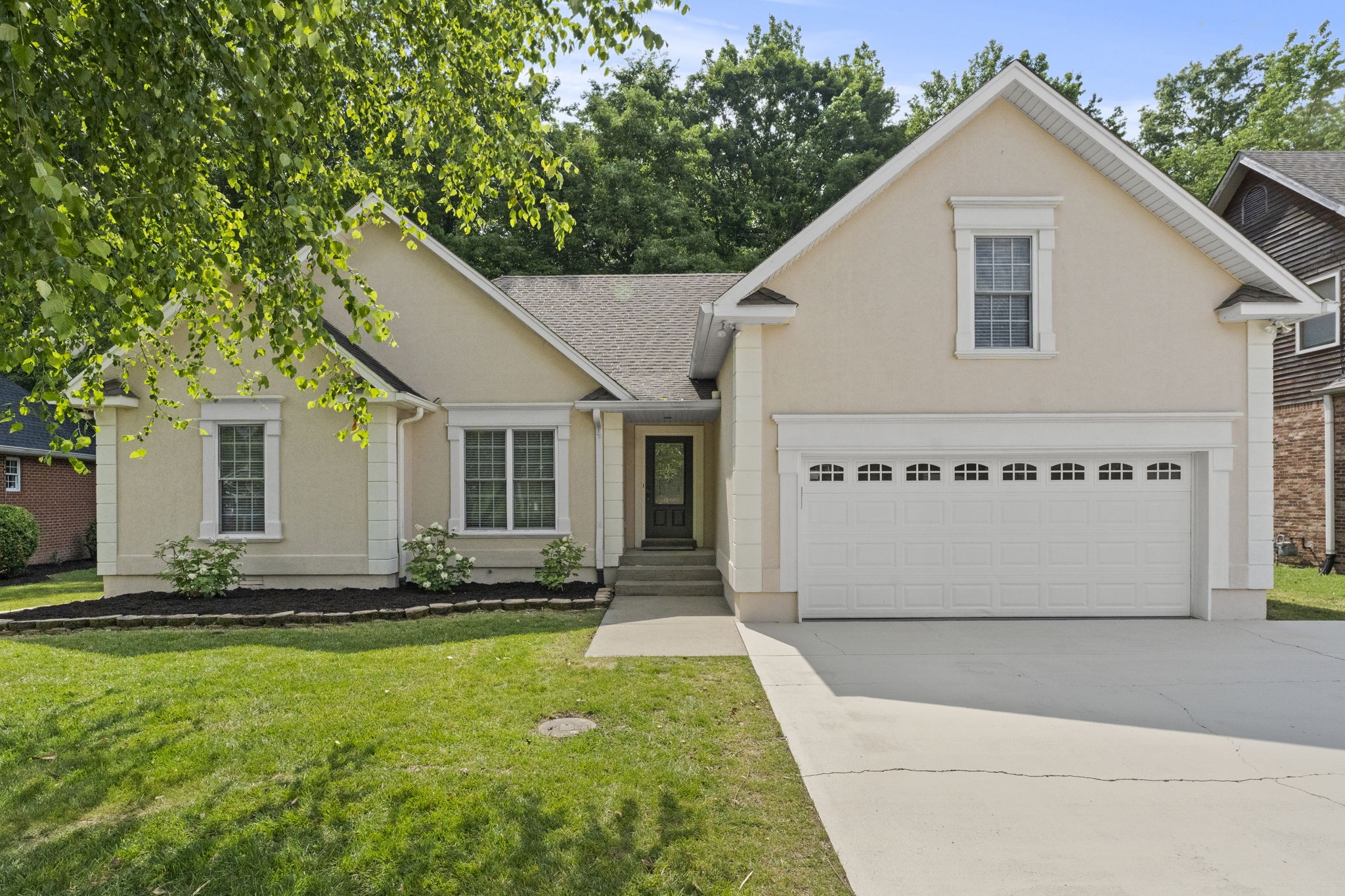 164 Foxrun Springfield, TN 37172 - Photo 4 of 37 a front view of a house with a yard