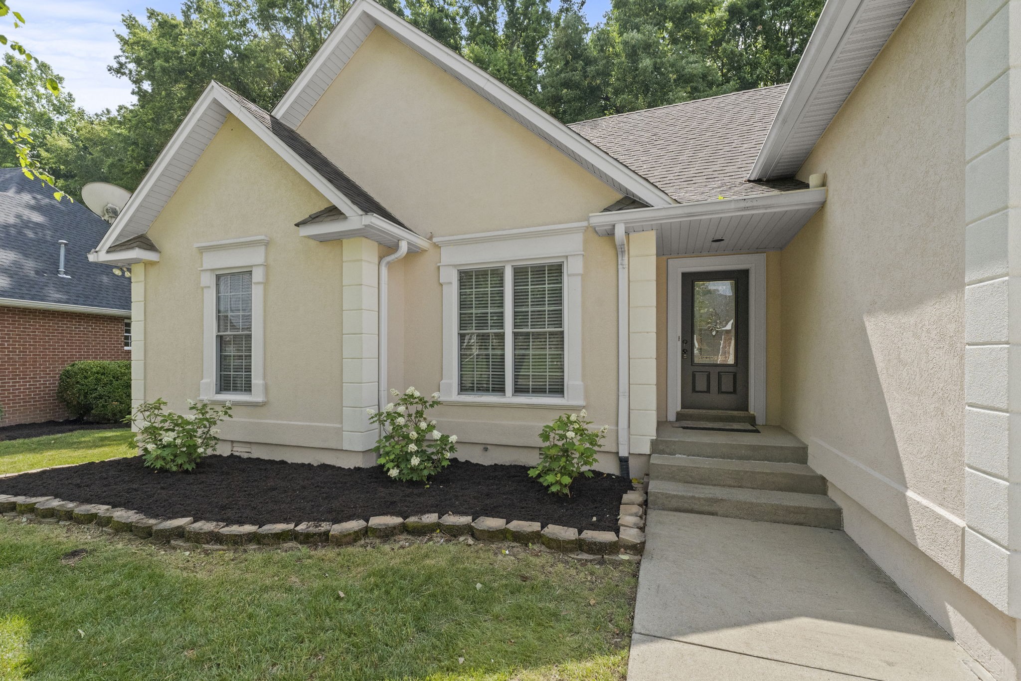 164 Foxrun Springfield, TN 37172 - Photo 5 of 37 a front view of a house with a yard
